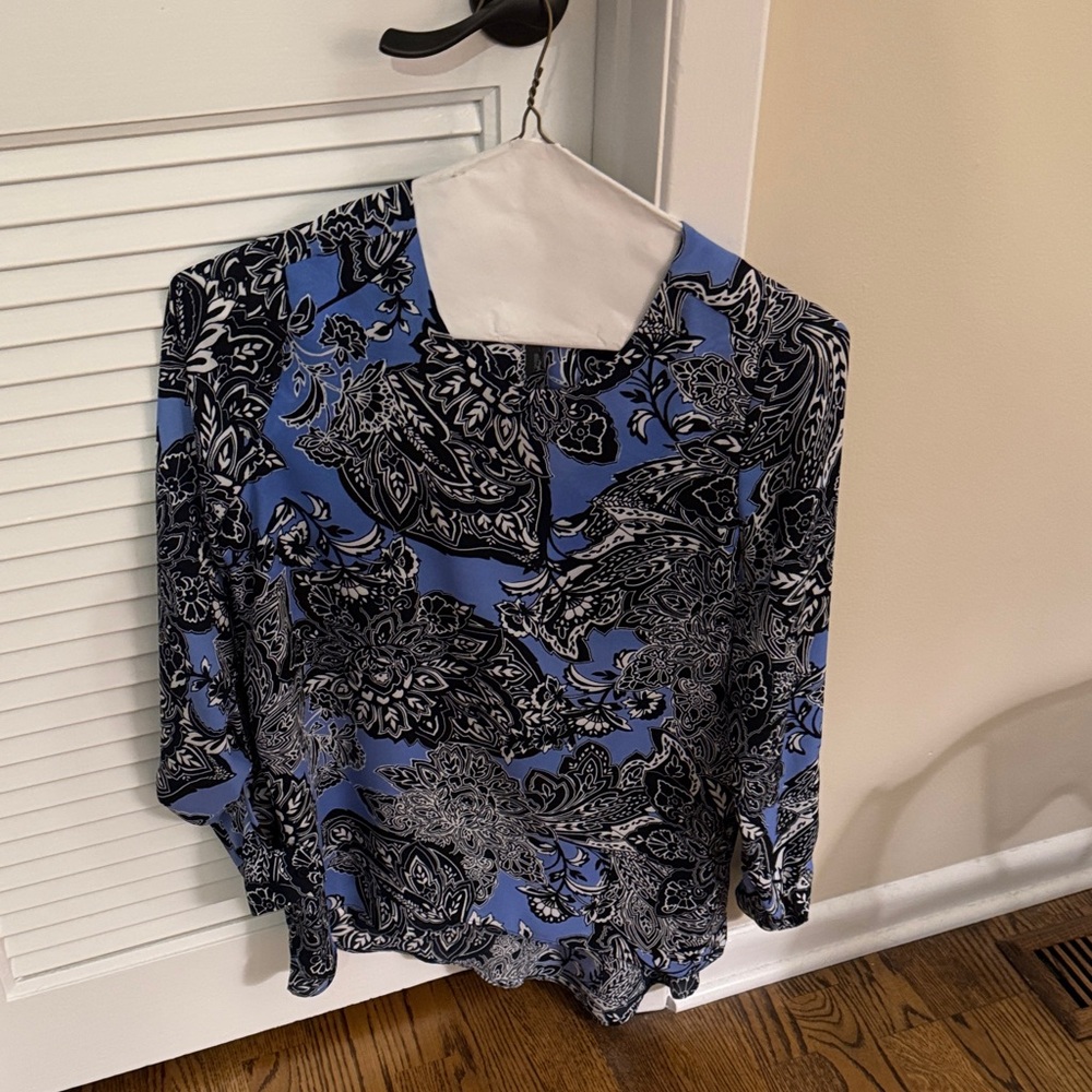 Gently used The Limited blouse blue/periwinkle with navy and white design.